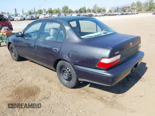 1997 Toyota Corolla with VIN 1NXBA02E7VZ601593, listed as a IAAI auction lot 42771723 with 247,823 mi miles and . Bid and sale history available at DreamBid. Image 3.