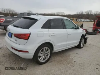 2017 Audi Q3 Premium Plus with VIN WA1JCCFSXHR008243, listed as a Copart auction lot 50393045 with 52,406 mi miles and Salvage title. Bid and sale history available at DreamBid. Image 3.