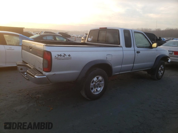 2000 Nissan Frontier XE with VIN 1N6ED26T8YC349616, listed as a Copart auction lot 85468524 with 207,578 mi miles and Salvage title. Bid and sale history available at DreamBid. Image 3.