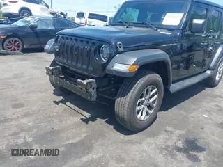 2023 Jeep Wrangler Sport S with VIN 1C4HJXDN5PW671167, listed as a IAAI auction lot 42176127 with 1,230 mi miles and . Bid and sale history available at DreamBid. Image 6.