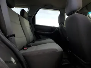 2004 Ford Escape XLS with VIN 1FMYU92184KA91008, listed as a Copart auction lot 80793134 with 159,429 mi miles and Salvage Title. Bid and sale history available at DreamBid. Image 11.