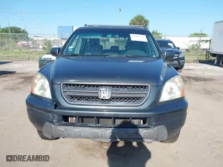 2003 Honda Pilot EX with VIN 2HKYF18533H612563, listed as a IAAI auction lot 41986321 with 259,252 mi miles. Bid and sale history available at carsss.com. Image 6.