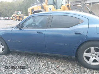 2009 Dodge Charger SXT with VIN 2B3KA33V39H585083, listed as a IAAI auction lot 41911176 with 134,600 mi miles and . Bid and sale history available at carsss.com. Image 13.