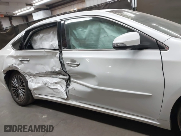 2016 Toyota Avalon Limited with VIN 4T1BK1EB0GU234267, listed as a IAAI auction lot 41567075 with 116,864 mi miles and . Bid and sale history available at carsss.com. Image 13.