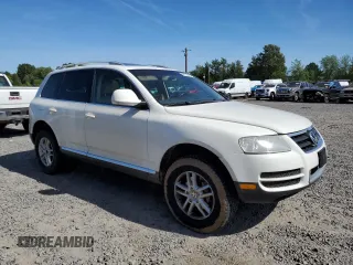 2008 Volkswagen Touareg V6 z VIN WVGBE77L68D012544, wystawiony jako Copart lot #58716985 z przebiegiem 148 637 mil mil oraz Czysty tytuł • Clean title. Historia ofert i sprzedaży dostępna na DreamBid. Obrazek 4.