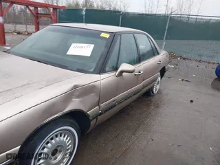 1999 Buick LeSabre Custom with VIN 1G4HP52K5XH476665, listed as a IAAI auction lot 42008177 with 34,279 mi miles. Bid and sale history available at carsss.com. Image 6.
