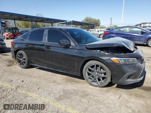 2023 Honda Civic Sport with VIN 2HGFE2F52PH526843, listed as a Copart auction lot 57826055 with 28,758 mi miles and Salvage title. Bid and sale history available at DreamBid. Image 4.