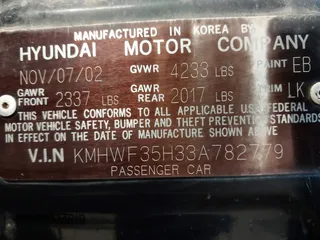 2003 Hyundai Sonata GLS with VIN KMHWF35H33A782779, listed as a IAAI auction lot 41702937 with 285,264 mi miles. Bid and sale history available at carsss.com. Image 9.