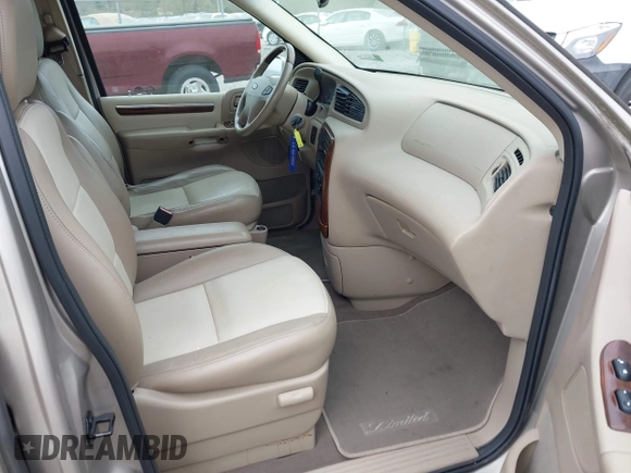 2002 Ford Windstar LTD with VIN 2FMDA58412BB61148, listed as a IAAI auction lot 42106861 with 81,828 mi miles and . Bid and sale history available at carsss.com. Image 5.
