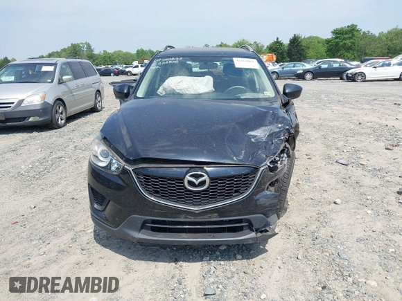 2014 Mazda CX-5 Sport with VIN JM3KE2BE3E0405976, listed as a IAAI auction lot 42161069 with 66,301 mi miles and . Bid and sale history available at carsss.com. Image 12.