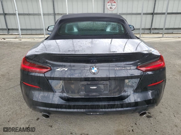 2022 BMW Z4 sDrive30i with VIN WBAHF3C08NWX72648, listed as a Copart auction lot 52153454 with 27,084 mi miles. Bid and sale history available at carsss.com. Image 6.