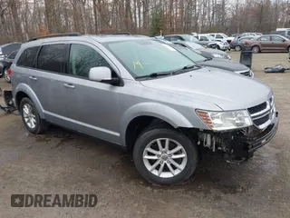 2016 Dodge Journey SXT with VIN 3C4PDCBG4GT122761, listed as a IAAI auction lot 41751265 with 130,304 mi miles. Bid and sale history available at carsss.com. Image 1.