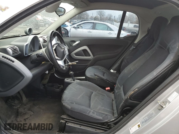 2008 Smart fortwo Pure z VIN WMEEJ31X08K095175, wystawiony jako Copart lot #52931165 z przebiegiem 102 299 mil mil oraz Szkody całkowita. Historia ofert i sprzedaży dostępna na DreamBid. Obrazek 7.