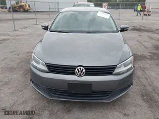 2014 Volkswagen Jetta Sedan SE with VIN 3VWD17AJ4EM428668, listed as a IAAI auction lot 41990578 with 132,672 mi miles. Bid and sale history available at carsss.com. Image 6.