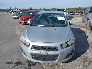 2015 Chevrolet Sonic LS with VIN 1G1JA6SH9F4128237, listed as a IAAI auction lot 41383896 with 215,524 mi miles and . Bid and sale history available at DreamBid. Image 6.