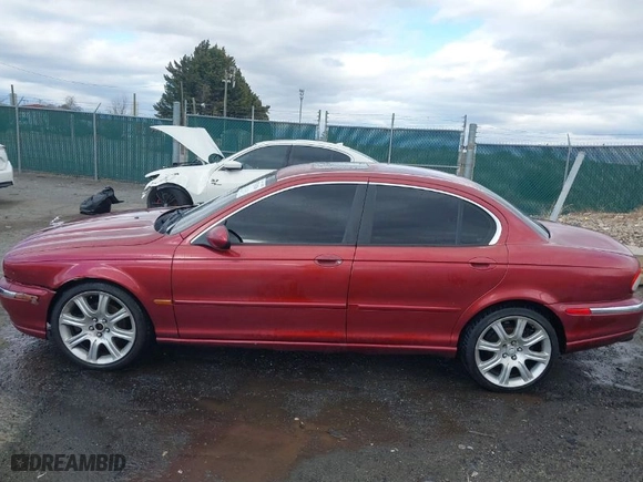 2005 Jaguar X-Type 3.0L with VIN SAJWA51A05WE55760, listed as a IAAI auction lot 41732516 with NaN miles. Bid and sale history available at carsss.com. Image 15.