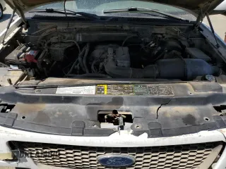 2003 Ford F-150 XL with VIN 2FTRX17213CA05950, listed as a Copart auction lot 54435115 with 310,503 mi miles and Salvage title. Bid and sale history available at DreamBid. Image 11.