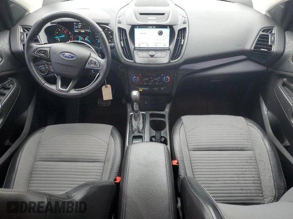 2018 Ford Escape SE z VIN 1FMCU9GD4JUA49819, wystawiony jako Copart lot #73023734 z przebiegiem 96 228 mil mil oraz Szkody całkowita. Historia ofert i sprzedaży dostępna na DreamBid. Obrazek 8.