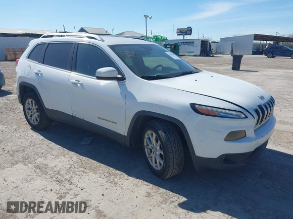 2016 Jeep Cherokee Latitude z VIN 1C4PJLCS0GW138381, wystawiony jako IAAI lot #41844589 z przebiegiem 100 991 mil mil oraz . Historia ofert i sprzedaży dostępna na DreamBid. Obrazek 1.