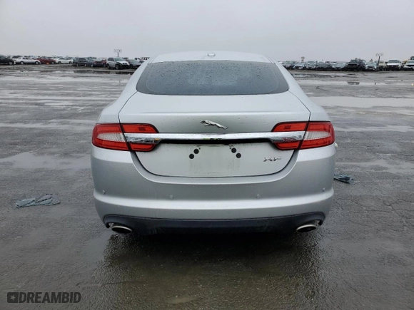 2012 Jaguar XF Portfolio with VIN SAJWA0HB8CLS41130, listed as a Copart auction lot 84322164 with 0 mi miles and Salvage Title. Bid and sale history available at carsss.com. Image 6.
