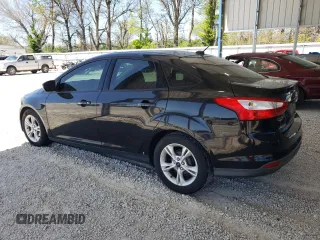 2014 Ford Focus SE with VIN 1FADP3F25EL460855, listed as a Copart auction lot 52911945 with 140,181 mi miles and Salvage Title. Bid and sale history available at DreamBid. Image 2.
