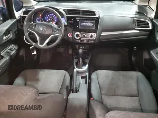 2015 Honda Fit EX-L z VIN 3HGGK5H88FM721318, wystawiony jako Copart lot #56717255 z przebiegiem 107 235 mil mil oraz Szkoda całkowita • Salvage title. Historia ofert i sprzedaży dostępna na DreamBid. Obrazek 8.