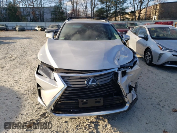 2018 Lexus RX 350 с VIN 2T2BZMCA8JC142223, выставлен на аукционе Copart как лот 81087844 с пробегом 142 603 миль миль и Списание • Salvage title. История ставок и продаж доступна на DreamBid. Изображение 5.