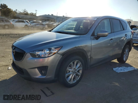 2014 Mazda CX-5 Grand Touring with VIN JM3KE2DY8E0412025, listed as a Copart auction lot 42863655 with 72,416 mi miles and Salvage Title. Bid and sale history available at carsss.com. Image 1.