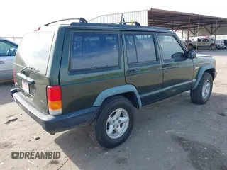 1998 Jeep Cherokee Sport with VIN 1J4FT68S8WL131348, listed as a IAAI auction lot 41912540 with 111,579 mi miles. Bid and sale history available at carsss.com. Image 4.