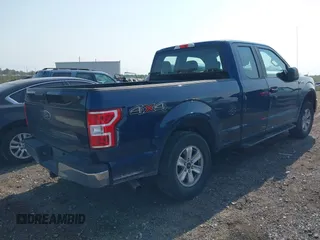 2019 Ford F-150 XL with VIN 1FTEX1EB9KKC09133, listed as a IAAI auction lot 40319582 with 151,728 mi miles. Bid and sale history available at carsss.com. Image 4.