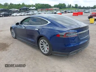 2016 Tesla Model S 90D with VIN 5YJSA1E4XGF168165, listed as a IAAI auction lot 42220139 with Not provided miles and . Bid and sale history available at DreamBid. Image 3.