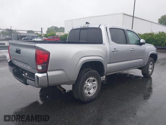 2023 Toyota Tacoma SR with VIN 3TYAX5GN0PT071080, listed as a IAAI auction lot 42426897 with 58,017 mi miles and . Bid and sale history available at DreamBid. Image 4.