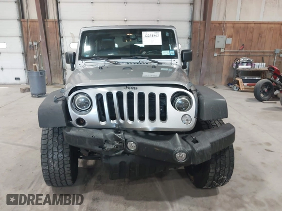 2014 Jeep Wrangler Sport with VIN 1C4AJWAG0EL173362, listed as a IAAI auction lot 42231863 with 99,321 mi miles and . Bid and sale history available at DreamBid. Image 12.