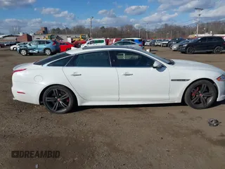 2015 Jaguar XJ with VIN SAJWA2EK9FMV87430, listed as a IAAI auction lot 41408797 with 101,147 mi miles and . Bid and sale history available at DreamBid. Image 13.