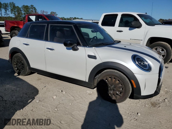 2024 MINI Hardtop 4 Door Cooper Classic with VIN WMW33DK00R2U88843, listed as a Copart auction lot 82409674 with 6,701 mi miles and Salvage Title. Bid and sale history available at DreamBid. Image 4.