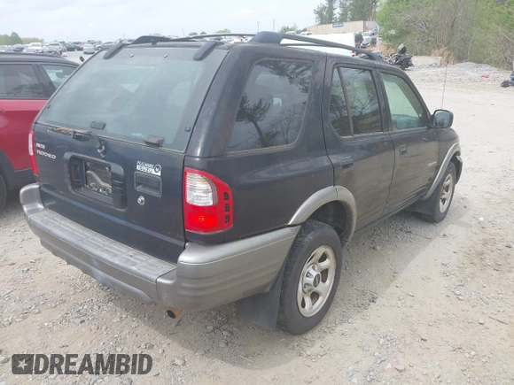 2002 Isuzu Rodeo S z VIN 4S2CK58W524322789, wystawiony jako IAAI lot #41966033 z przebiegiem 251 311 mil mil oraz . Historia ofert i sprzedaży dostępna na DreamBid. Obrazek 4.