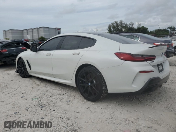 2020 BMW 8 Series M850i with VIN WBAGV8C00LCD38284, listed as a Copart auction lot 60605075 with 57,161 mi miles and Salvage title. Bid and sale history available at DreamBid. Image 2.