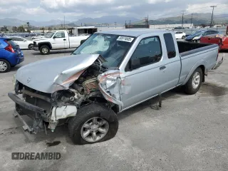 2003 Nissan Frontier XE with VIN 1N6DD26T93C405213, listed as a Copart auction lot 50974605 with 292,292 mi miles and Salvage title. Bid and sale history available at DreamBid. Image 1.