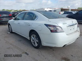 2014 Nissan Maxima SV with VIN 1N4AA5AP6EC446580, listed as a IAAI auction lot 42762381 with 184,665 mi miles and . Bid and sale history available at DreamBid. Image 3.