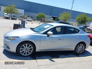 2017 Mazda 3 Touring with VIN 3MZBN1V76HM119389, listed as a IAAI auction lot 42772015 with 128,555 mi miles and . Bid and sale history available at DreamBid. Image 14.