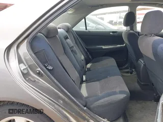 2003 Toyota Camry LE with VIN JTDBE32K530236769, listed as a IAAI auction lot 42250783 with 194,445 mi miles and . Bid and sale history available at DreamBid. Image 8.