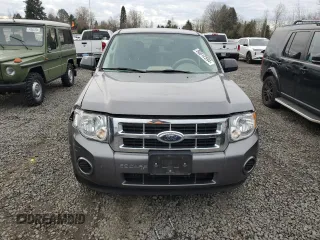 2009 Ford Escape XLS z VIN 1FMCU92759KB19563, wystawiony jako Copart lot #86012594 z przebiegiem 98 615 mil mil oraz Czysty tytuł • Clean title. Historia ofert i sprzedaży dostępna na DreamBid. Obrazek 5.