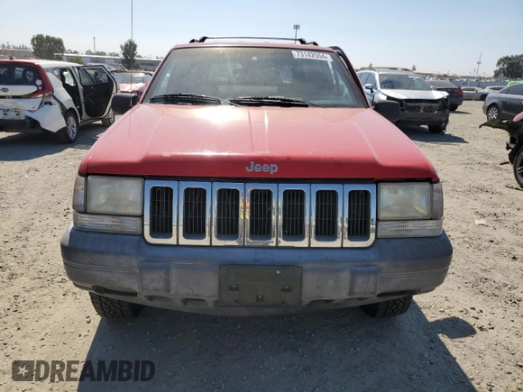 1997 Jeep Grand Cherokee TSi with VIN 1J4FX58SXVC545910, listed as a Copart auction lot 73142554 with 180,896 mi miles and Salvage Title. Bid and sale history available at carsss.com. Image 5.