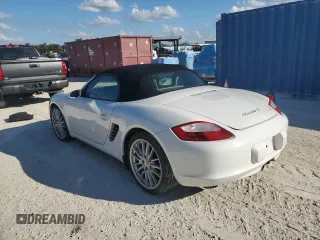2007 Porsche Boxster S z VIN WP0CB29837U730970, wystawiony jako Copart lot #77829184 z przebiegiem Nie podano mil oraz Szkoda całkowita • Salvage title. Historia ofert i sprzedaży dostępna na DreamBid. Obrazek 2.