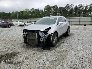 2017 Cadillac XT5 Luxury FWD with VIN 1GYKNBRSXHZ157904, listed as a Copart auction lot 51513025 with 140,108 mi miles and Salvage Title. Bid and sale history available at DreamBid. Image 15.