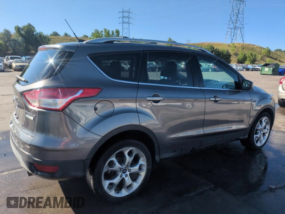2013 Ford Escape Titanium with VIN 1FMCU0J93DUA78278, listed as a Copart auction lot 63519845 with 141,874 mi miles and Salvage title. Bid and sale history available at DreamBid. Image 3.