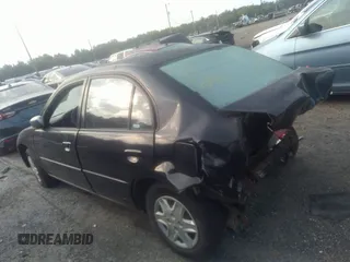 2003 Honda Civic LX with VIN 2HGES16563H602363, listed as a IAAI auction lot 40123995 with 165,413 mi miles. Bid and sale history available at carsss.com. Image 3.