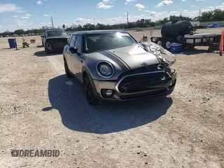 2016 MINI Clubman z VIN WMWLN5C57G2B28303, wystawiony jako Copart lot #56638375 z przebiegiem 130 262 mil mil oraz Szkoda całkowita • Salvage title. Historia ofert i sprzedaży dostępna na DreamBid. Obrazek 16.