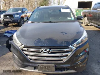 2016 Hyundai Tucson Limited with VIN KM8J3CA23GU165293, listed as a IAAI auction lot 41756821 with 59,998 mi miles. Bid and sale history available at carsss.com. Image 12.
