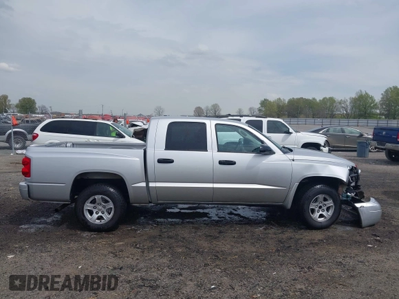 2007 Dodge Dakota SLT with VIN 1D7HE48KX7S122712, listed as a IAAI auction lot 41888864 with 114,384 mi miles and . Bid and sale history available at carsss.com. Image 13.